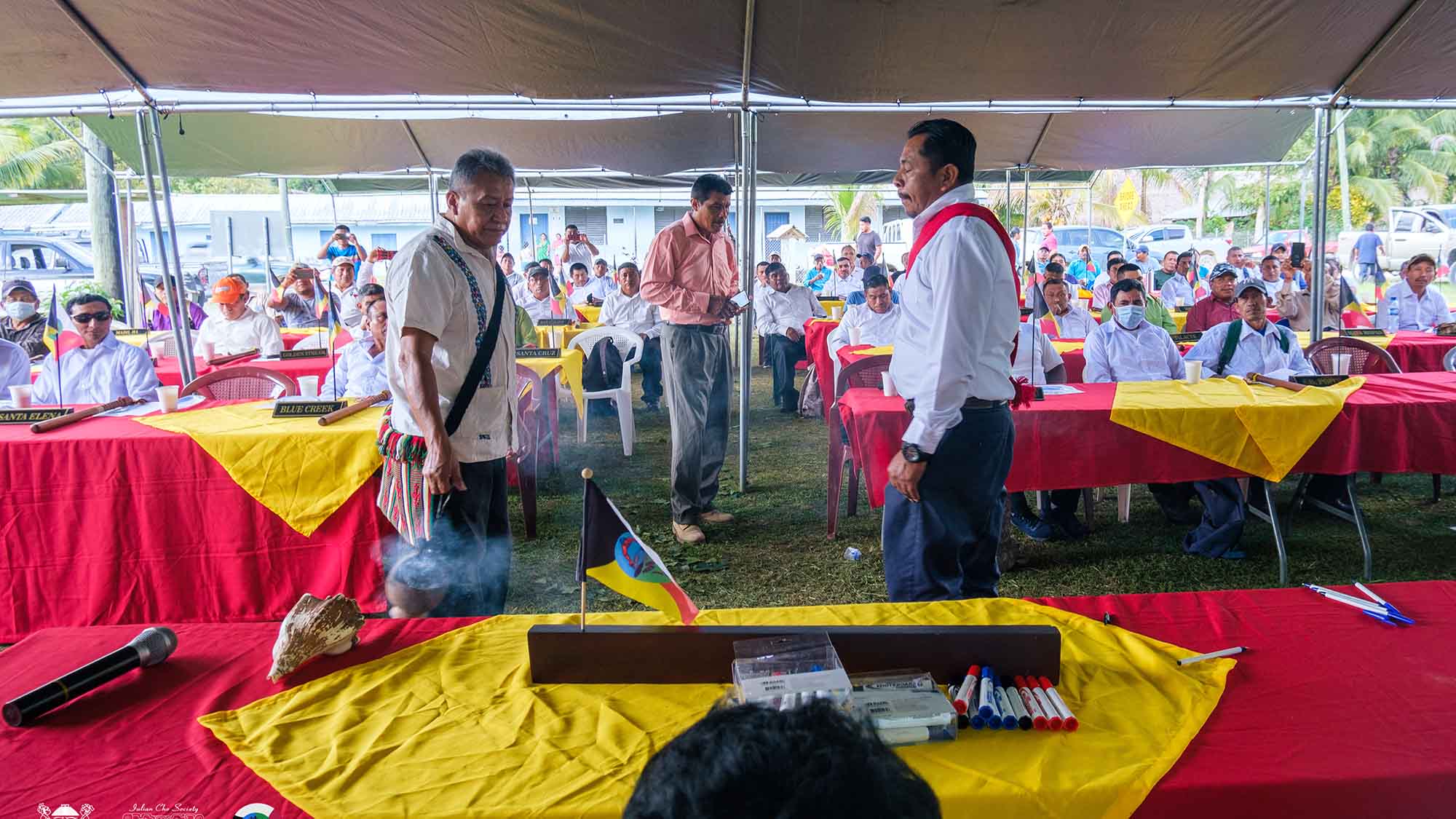 Alcaldes and community members at a village assembly